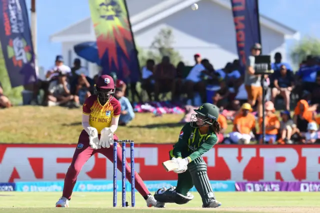 Pakistan's Muneeba Ali (R) plays a shot leading to West Indies' wicketkeeper Rashada Williams (L) catching her out during the Group B T20 women's World Cup cricket match between Pakistan and West Indies at Boland Park in Paarl