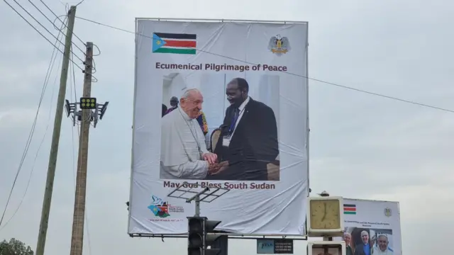 Poster welcoming the Pope