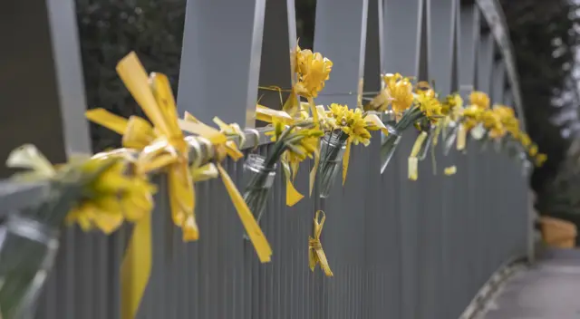 Flowers,and ribbons on a bridge over the River Wyre in St Michael's on Wyre, Lancashir