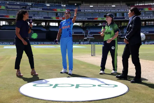 Harmanpreet Kaur and Laura Delany at the toss