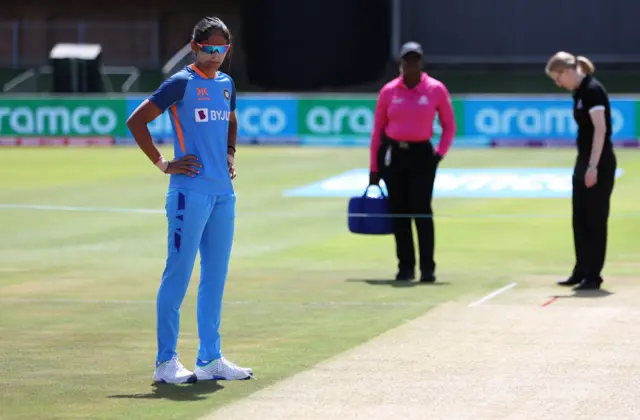 India captain Harmanpreet Kaur looking at the pitch