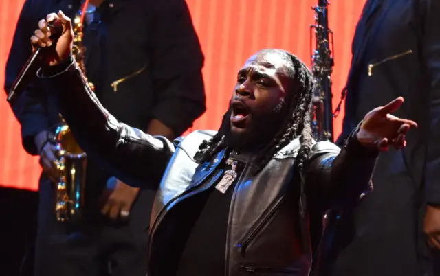 Nigerian singer Burna Boy performs during the half time show of the NBA All-Star game between Team Giannis and Team LeBron at the Vivint arena in Salt Lake City, Utah, February 19, 2023.