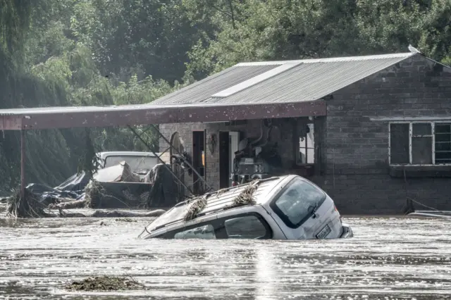 A car is submerged under water in Lochvaal on February 19, 2023