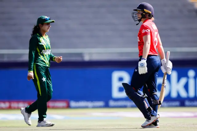 England skipper Heather Knight walks off after being dismissed against Pakistan