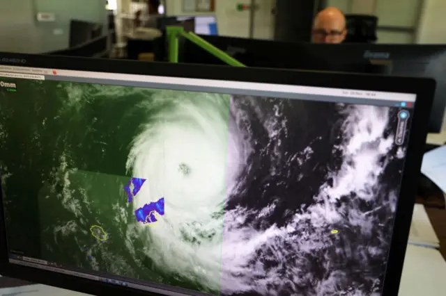 Forecasters monitor Cyclone Freddy at the France weather station