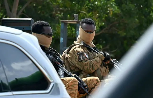 Soldiers guard the General Sangoule Lamizana military camp in Ouagadougou on October 8, 2022