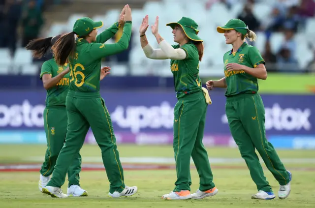 Nadine de Klerk of South Africa celebrates the wicket of Murshida Khatun of Bangladesh during the ICC Women's T20 World Cup group A match between South Africa and Bangladesh at Newlands Stadium