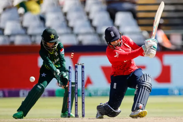 England's Alice Capsey is bowled by Pakistan's Sadia Iqbal