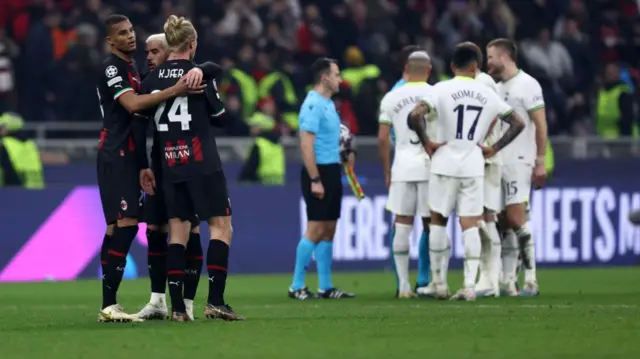 AC Milan celebrate beating Tottenham