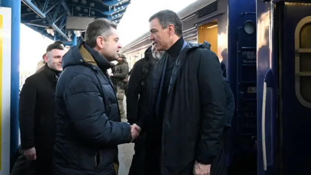 Spain's Prime Minister Pedro Sanchez is greeted by Ukrainian official as he arrives in Ukraine for a visit with Ukraine's President Volodymyr Zelenskiy