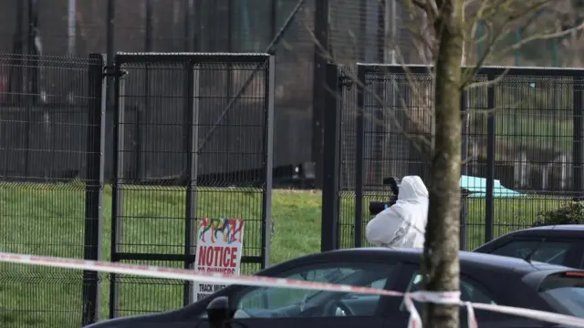 PSNI forensic officers at the scene in the Killyclogher Road area of Omagh today