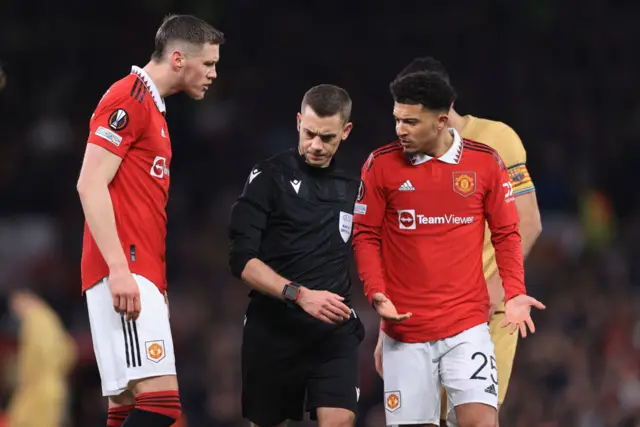 Weghorst and Sancho both complain to the referee.