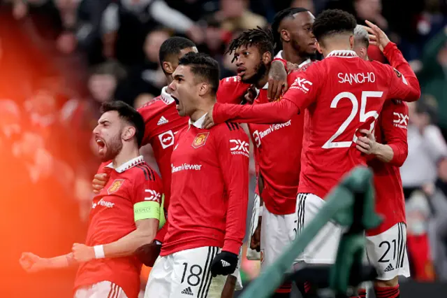 Manchester United players celebrate Fred's equaliser.