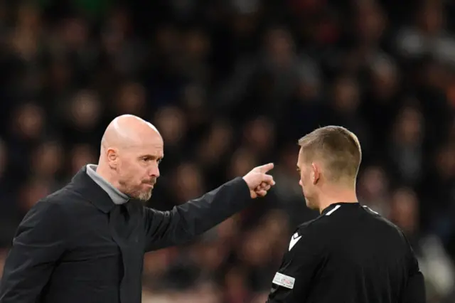 Ten Haag speaks to referee Clément Turpin.