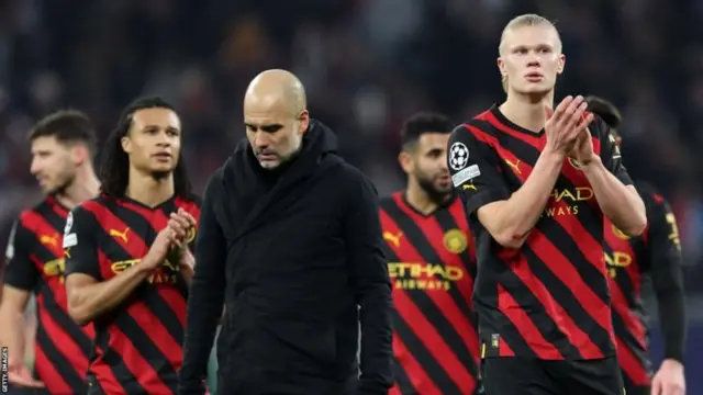 Man City players and Pep Guardiola applaud fans after drawing with RB Leipzig