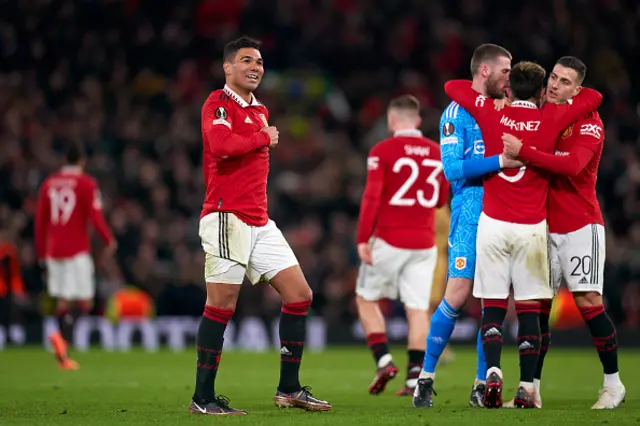 Man United players celebrate beating Barcelona.