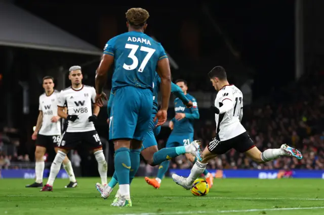 Manor Solomon of Fulham scores against Wolves