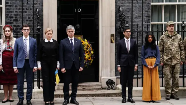 Prime Minister Rishi Sunak led the minute's silence outside Downing Street