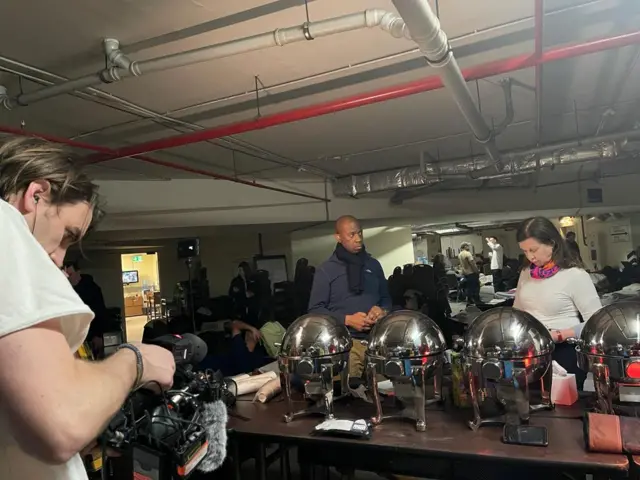 Clive Myrie and Lyse Doucet broadcasting from an underground car park in Kyiv