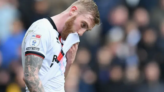 A Sheffield United player reacts during their defeat at Millwall