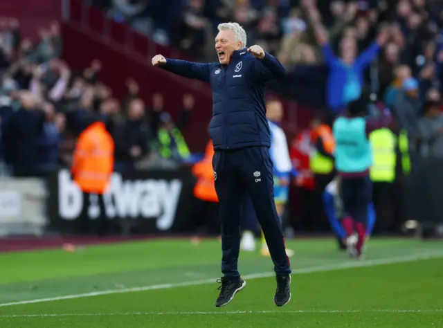 West Ham David Moyes celebrates on the pitch at London Stadium