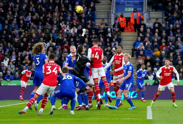 Leicester City goalkeeper Danny Ward is fouled by ben White