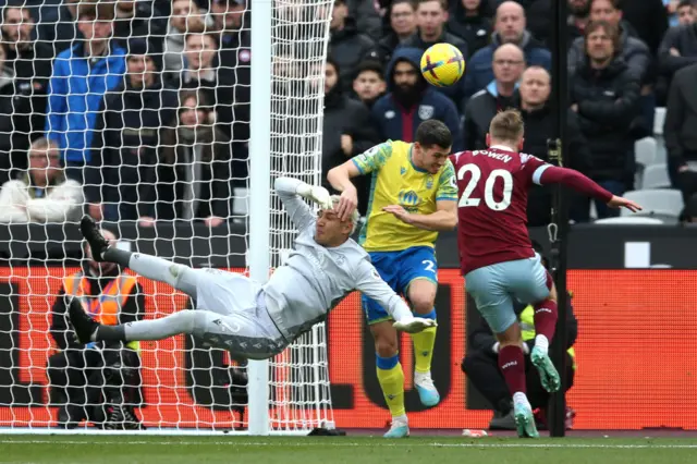 Nottingham forest goalkeeper Keylor Navas comes for the ball