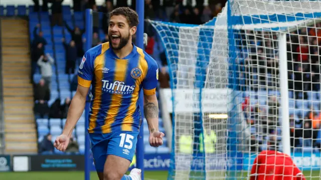 Rekeil Pyke celebrates a goal for Shrewsbury Town