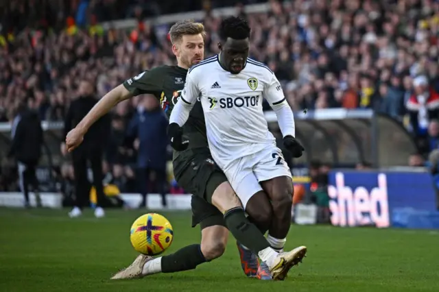 Southampton midfielder Stuart Armstrong booked for foul on Leeds' Wilfried Gnonto
