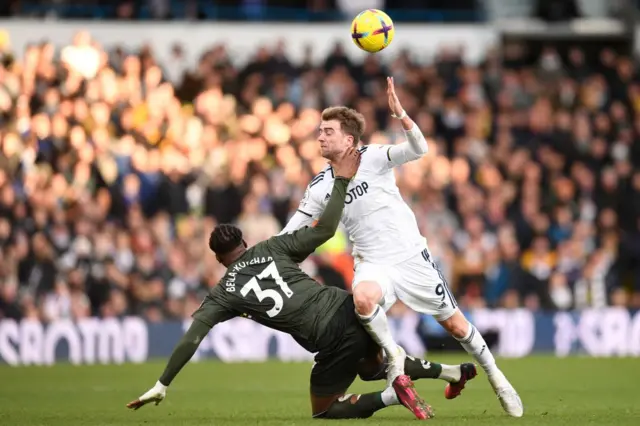 Southampton's Armel Bella-Kotchap vies with Leeds United's Patrick Bamford