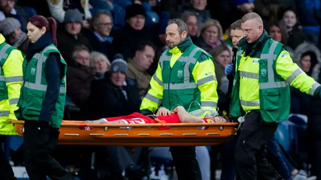 Paddy McNair stretchered off