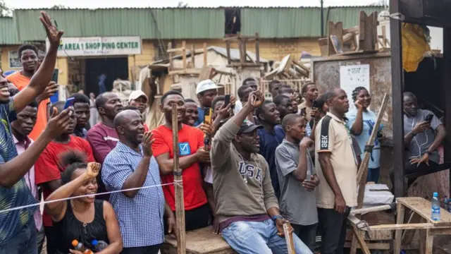 Voters in Abuja, Nigeria, cheering