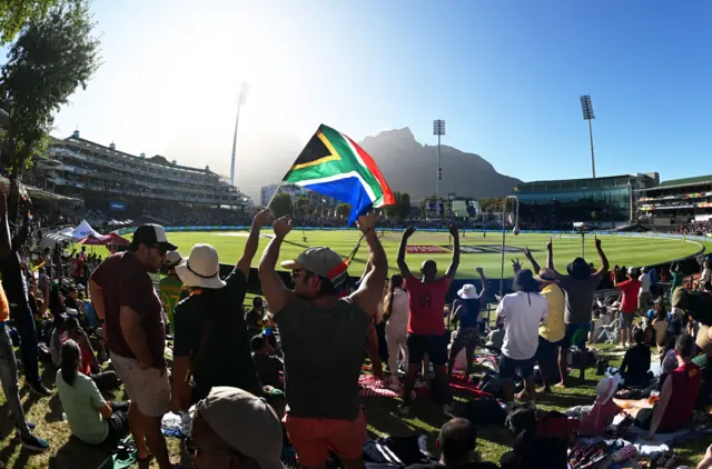 South Africa fans cheer a Chloe Tryon six