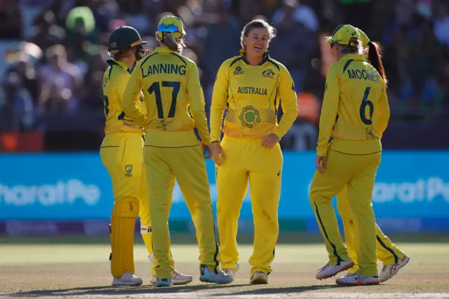 Australia celebrate the wicket of Chloe Tryon