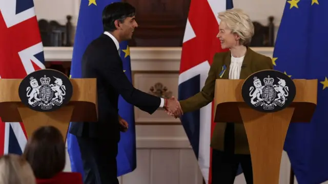 UK Prime Minister Rishi Sunak and EU Commission President Ursula von der Leyen shake hands as they hold a press conference at Windsor Guildhall