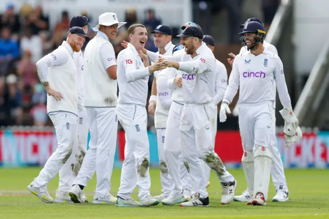 England's Harry Brook celebrates taking his first Test wicket v New Zealand