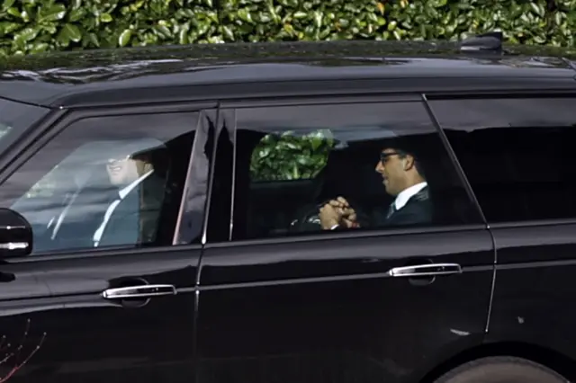 Prime Minister Rishi Sunak in the back of a car