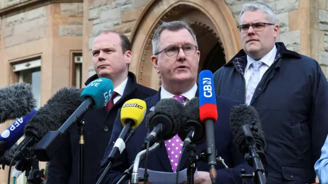 Sir Jeffrey Donaldson with party colleagues Gordon Lyons and Gavin Robinson after meeting Prime Minister Rishi Sunak