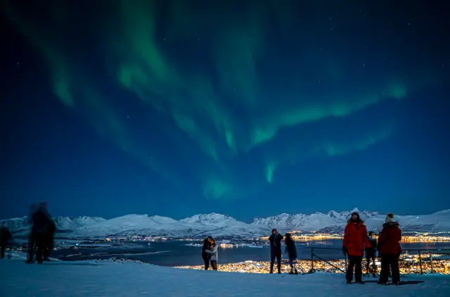 The Aurora Borealis over Tromsø, Norway back in January: Shutter speed of two seconds, ISO 1000, f/2.8 aperture