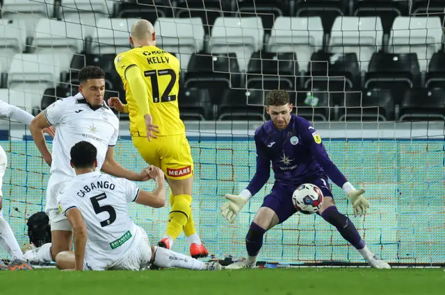 Andy Fisher saves from Georgie Kelly