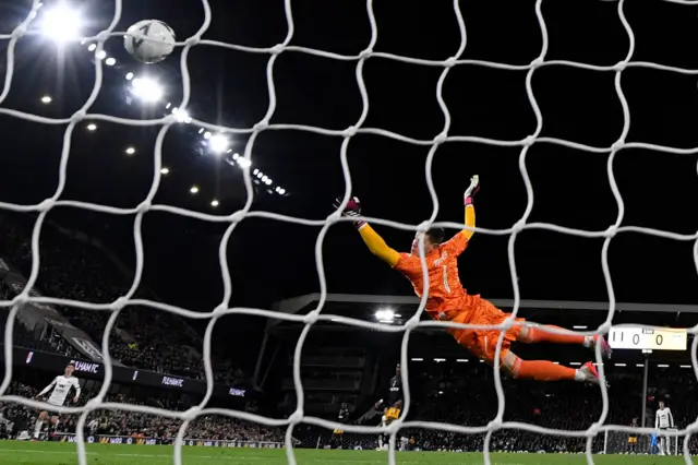 Joao Palhinha curls the ball past Illan Meslier