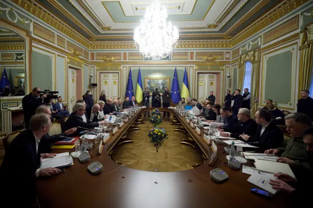 Ukraine's President Volodymyr Zelenskiy, European Commission President Ursula von der Leyen and European Council President Charles Michel attend a meeting during a European Union summit