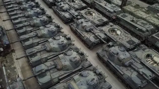 A high-angle shot of a number of Leopard 1 tanks