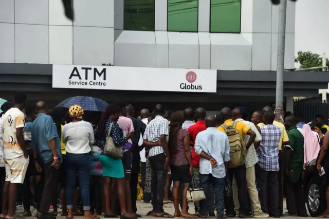 People queuing to get cash