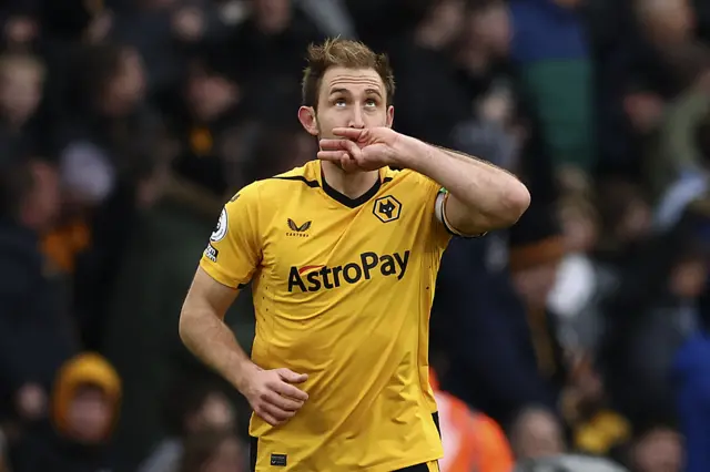 Craig Dawson celebrates