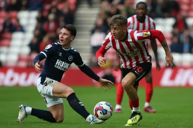 Millwall's Dan McNamara and Sunderland's Jack Clarke