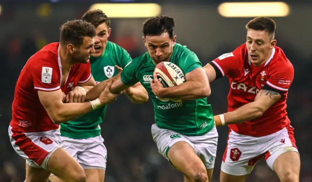 Hugo Keenan carries the ball for Ireland