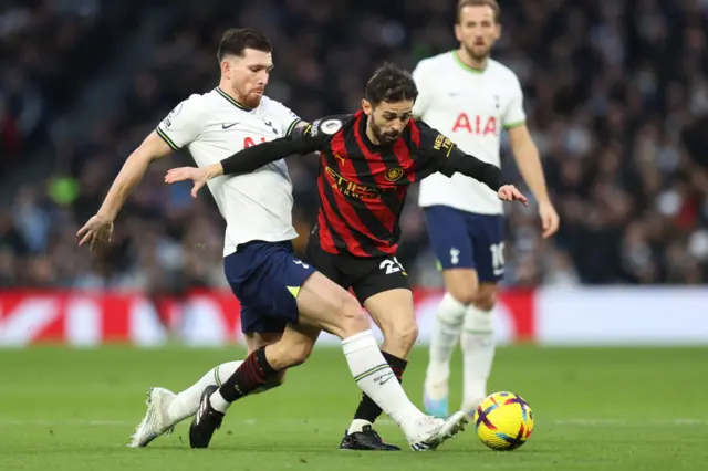 Bernardo Silva battles for possession with Pierre-Emile Hojbjerg