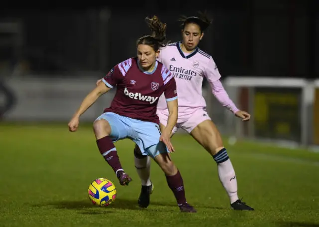 Melisa Filis of West Ham United battles for possession with Rafaelle Souza