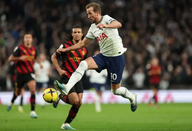 Harry Kane controls the ball.